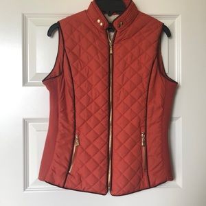 Quilted vest with sherpa lining. Size small.